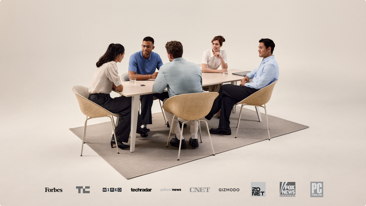 Five professionals in a meeting with a Plaud Note on the table, featuring media endorsements from Forbes and Wired.